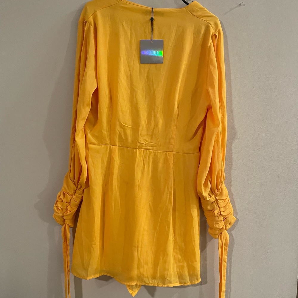 Yellow mustard dress with ruffled sleeves size 12 with slits on sleeves